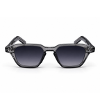 Sunglasses with a transparent frame and dark lenses on a white background